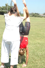 Ruth doing hand stands @ The Finish (by Louis Rossouw)