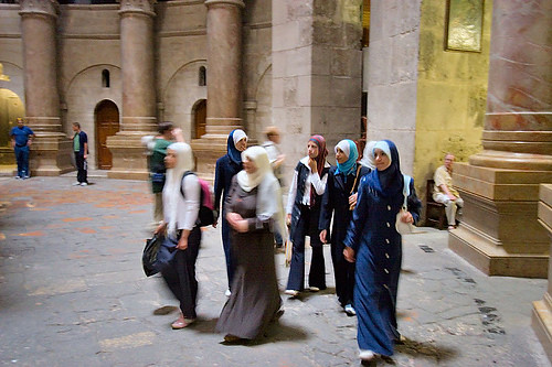 Muslim women respectfully visiting the Church of the Holy Sepulcher
