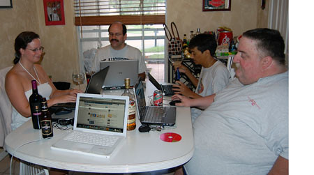 i choose to steal the pic writersblock posted because im so amused at all of us geeks with our laptops open while playing poker