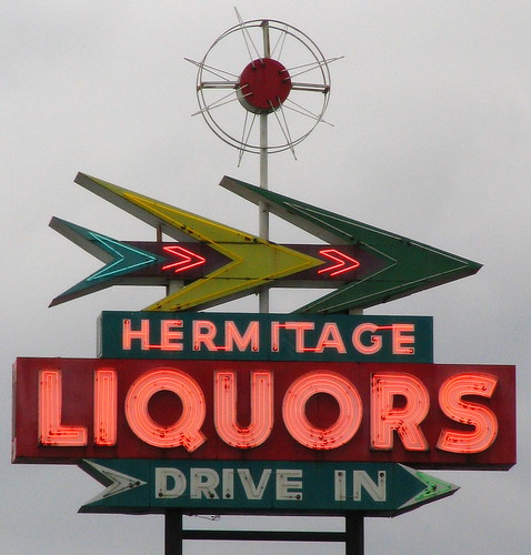 Hermitage Liquors sign - Illuminated cloudy version