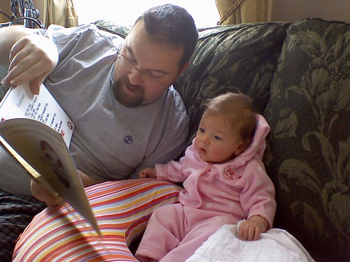 Eva and Daddy reading