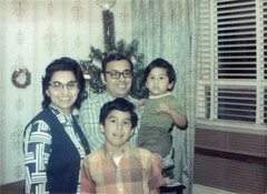 Tina, Ruben, James & Robert celebrate Christmas in Chicago. (12/1971)