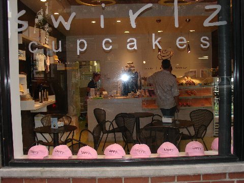 Pink hat window at Swirlz Cupcakes