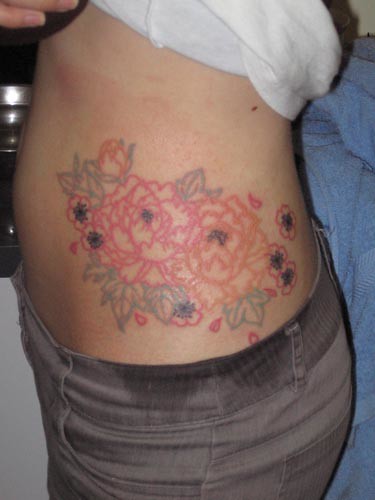 The outline of the lower part of my tattoo peonies and cherry blossoms