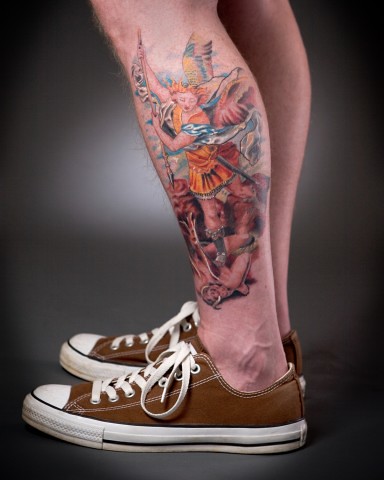 This tattoo is a copy of the Raphael painting "St. Michael Slaying the Devil 