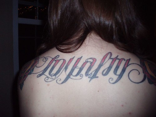 Rachel's super cool tattoo. It says Loyalty and Betrayal upside down.