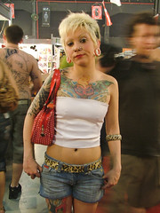 Girl Tattoo - Tattooed girl butterfly designs