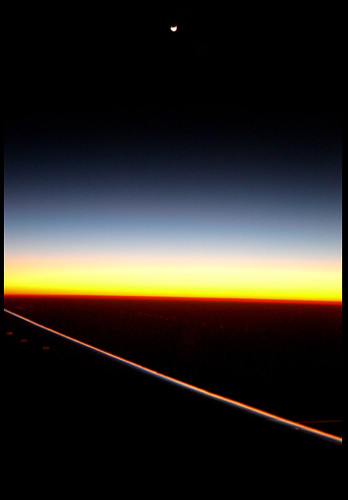 Patricia Thompson|Sunrise and Moon from Airplane Sunrise and Moon from Airplane. richard_patricia_thompson
