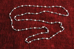 Four foot string of glass pearls (with metal beads)