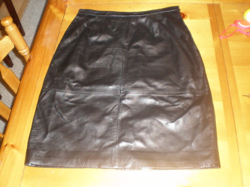 black knee length skirt. Black knee-length butter soft