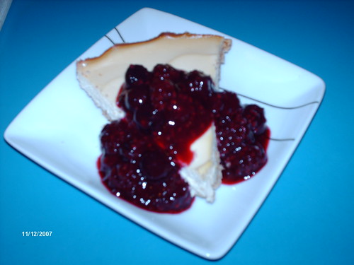 Almond Cheese Cake with Mixed Berry Sauce