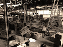 Photo of crates in a warehouse. Licensed under creative commons by Don Jones.