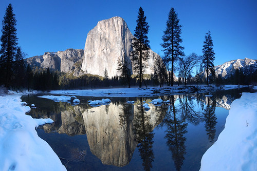 Photo: El Capitan reflected in the Merced River surrounded by snow. Photo by Tyler Westcott.