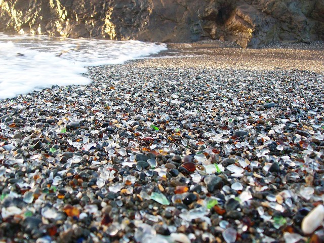 Close-up view of the colored glass beads mixed in the sand at Glass Beach near Fort Bragg, CA - glassbeach36x