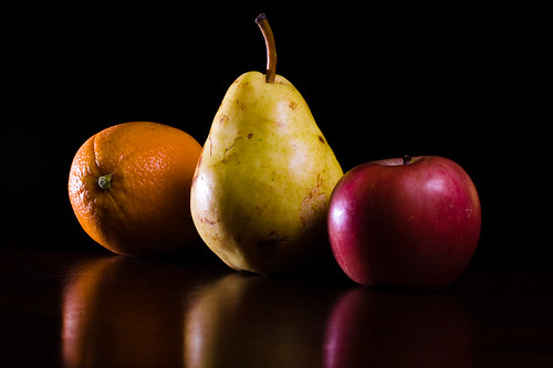 Oranges And Apples. Orange, pear, apple