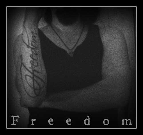 Andrew writes with this simple message on his forearm Freedom Tattoo
