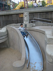 Sliding down the slide in Portsmouth Square
