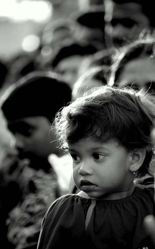 Little Girl watching the Carnival Parade