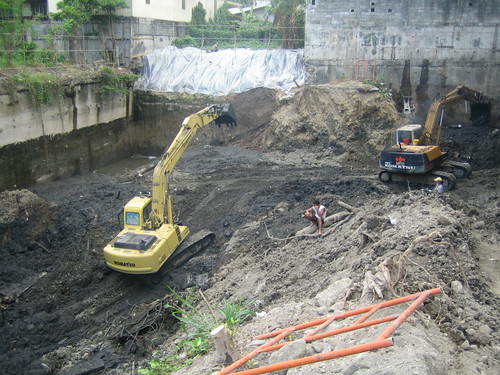 excavators at work. excavators at work. Excavators at Work. at a Quezon City Project along