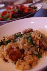 risotto with sausage, caramelized onions, and bitter greens