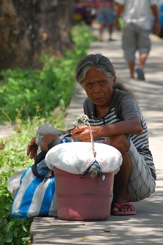 Elderly woman rest beside a footpath Cebu  Consolacion Public Market Pinoy Filipino Pilipino Buhay  people pictures photos life Philippinen  菲律宾  菲律賓  필리핀(공화국) Philippines    