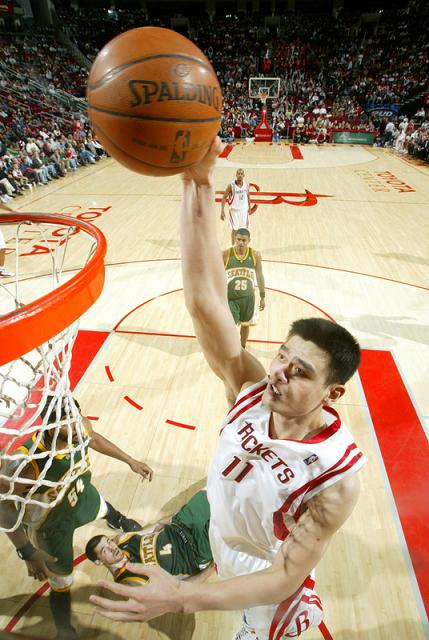 Yao Ming throws down a dunk Monday night against Seattle on his way to 30 points and 17 boards to lead Houston to a victory.