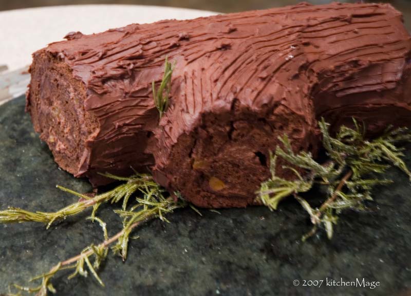 buche de noel with candied rosemary sprigs