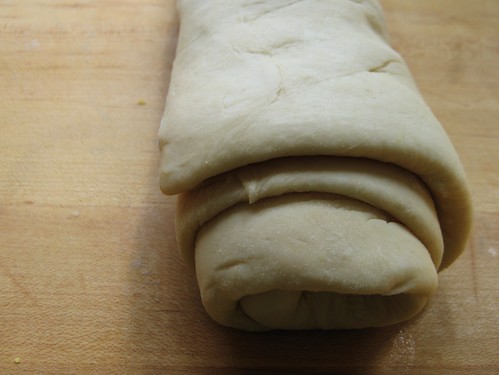 baking bread: dough rolled up