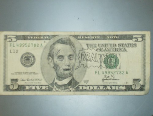 Just a fun little doodle on a five dollar bill. Part of a series of defaced 