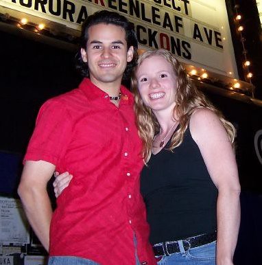 Sol and Monica in Front of a Marquee After a Gig