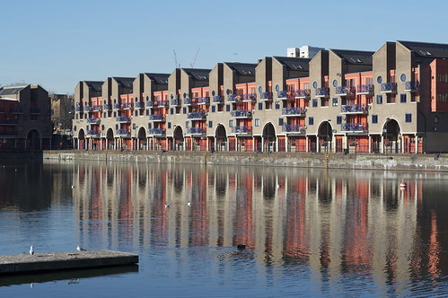 apartments reflected in water