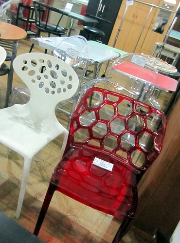 clear chairs from woman
