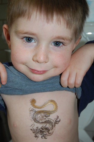 It was a pretty awesome tattoo of a dragon. That dragon tat stayed on Julian