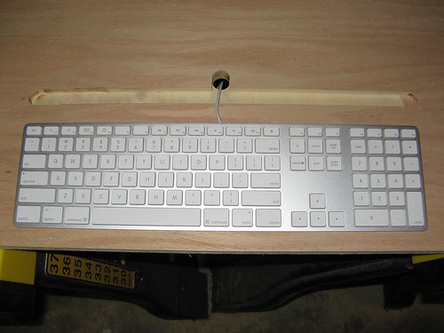 Keyboard tray routing
