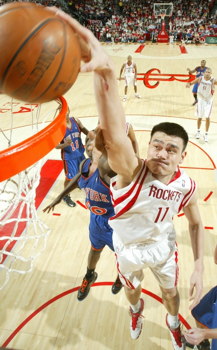 Yao Ming goes up for a dunk over the New York Knicks' David Lee on Saturday night.  Yao was dominant, finishing with 30 points, 8 rebounds, 6 assists and 4 blocks in a 103-91 win.  Aaron Brooks was also incredible, scoring 22 points on 8-of-10 shooting and amazing everyone with his speed and three-point shooting.