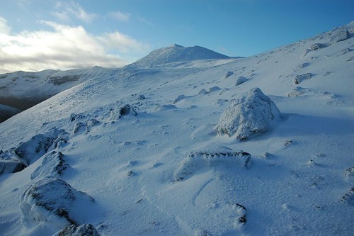 Snowy summit of Meall a' Ghiubhais