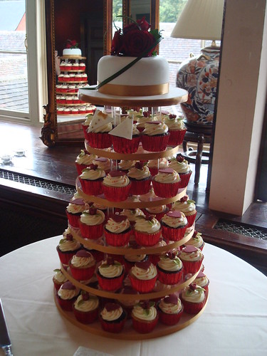 Red gold wedding cupcake tower