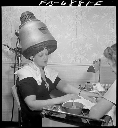 New York, New York. Getting a manicure while drying hair at Francois de Paris, a hairdresser on Eighth Street (LOC)