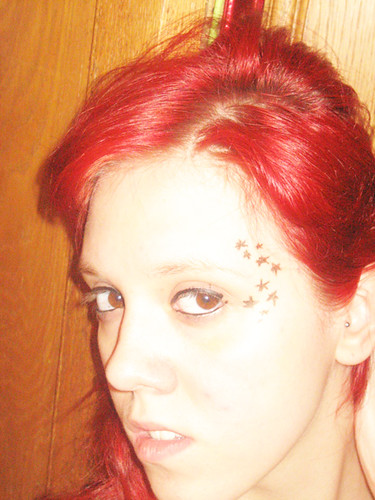 My old red hair with eyeliner drawn stars like Kat Von D.