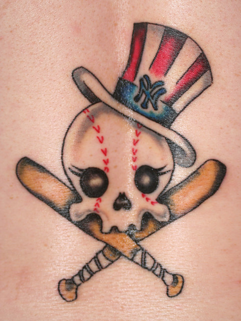 Yankees Tattoo on Lower Back. Done by Russell Kelley at Silk CIty