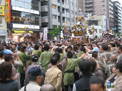 Mikoshi being carried through the streets of Asakusa
