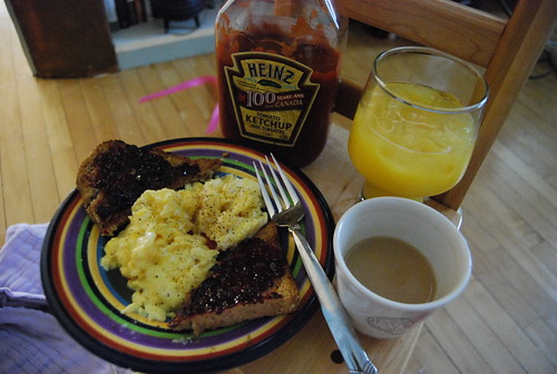 Scrambled eggs, toast, OJ and coffee