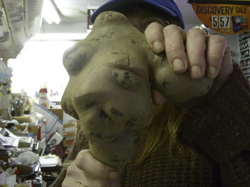 Janice wears the potato mask at Everybody's Market