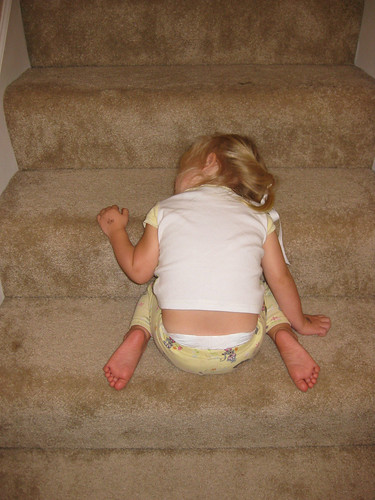 Micah asleep on the stairs, again