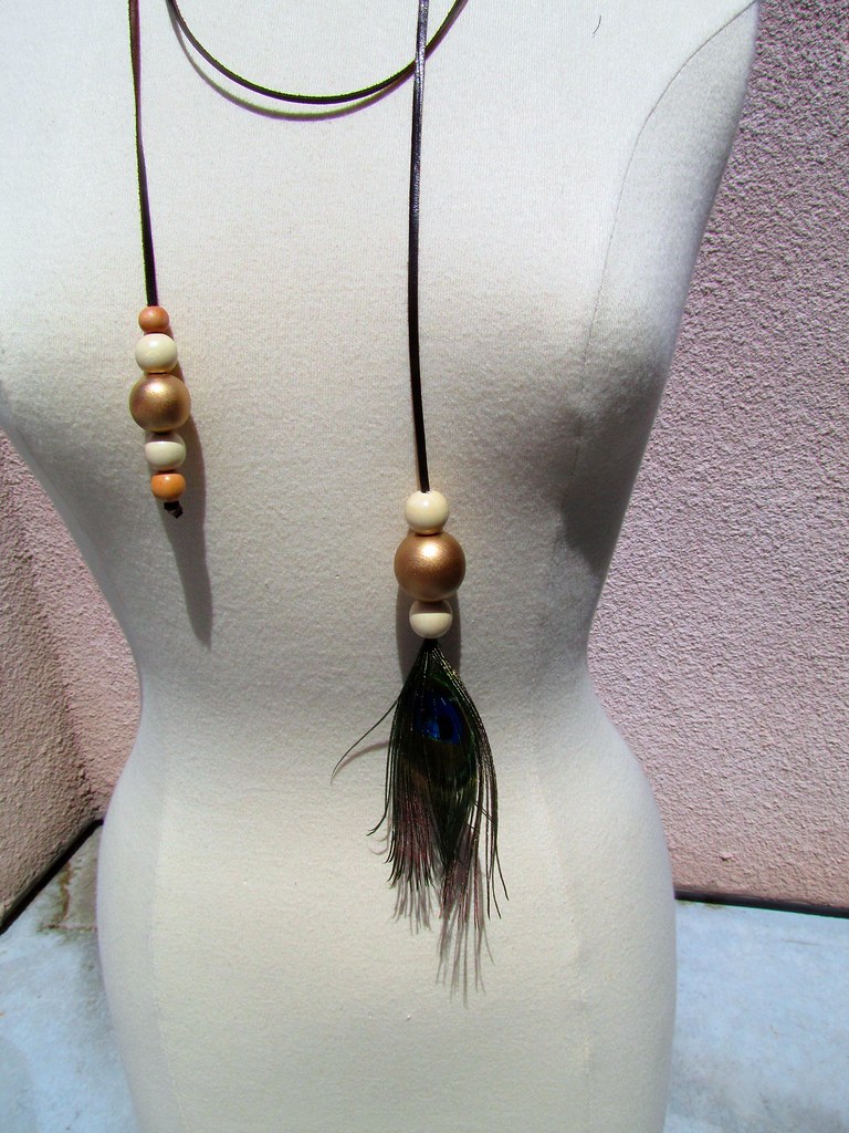 leather, beads, peacock feather necklace, belt
