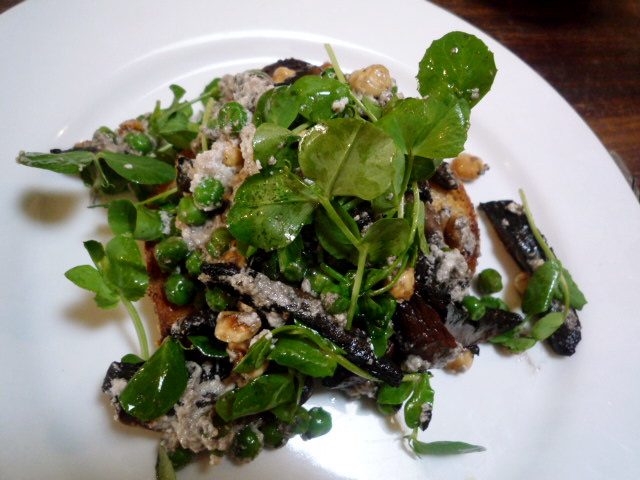 Mushrooms and peas with hazelnut, ricotta and thyme salad on toast