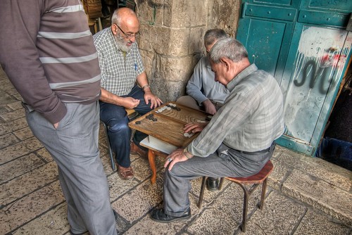 Men Playing Backgammon
