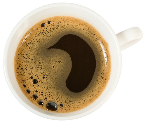 over a cup of coffee white background