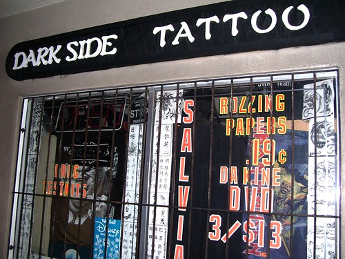 Dark Side Tattoo window ads