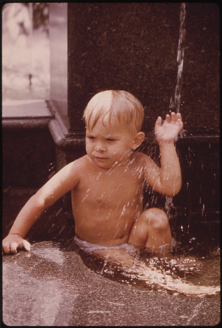 August Brings the "D'aug Days" to Fountain Square. "D'aug Days" Is a Month Long Festival of Arts Presented to, for, and Sometimes by, the People. At the Tyler Davidson Fountain, Taking a Bath Is Fun 08/1973